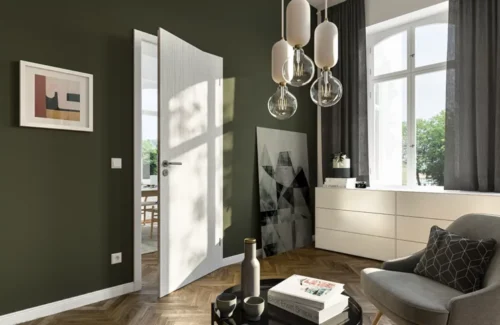 Weiße Holztüre in Raum mit grüner Wand und Moderner, organischer Möblierung.